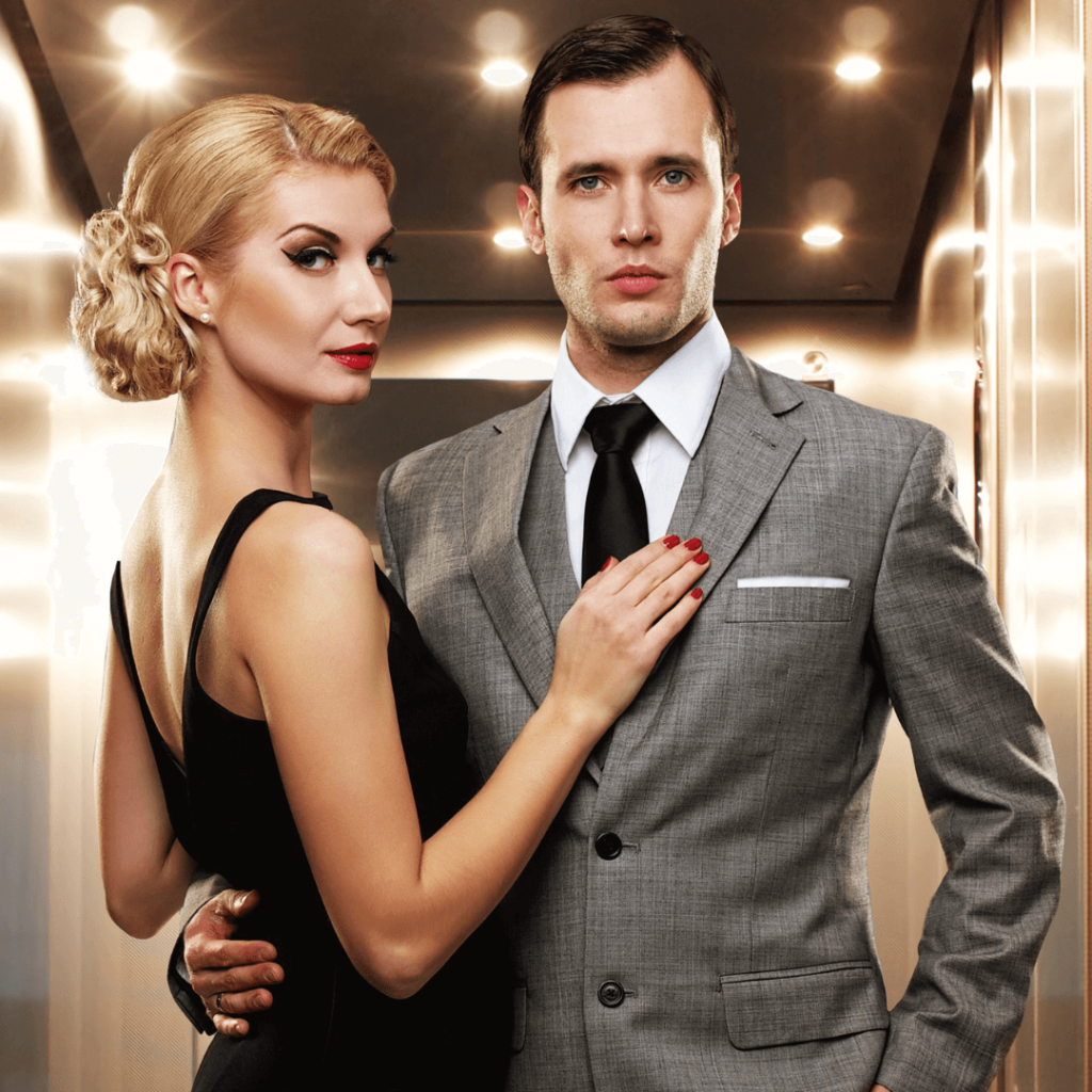 Elegant couple in formal wear exuding confidence, showcasing the upscale dating success and image transformation offered by Orlando Date Coach.
